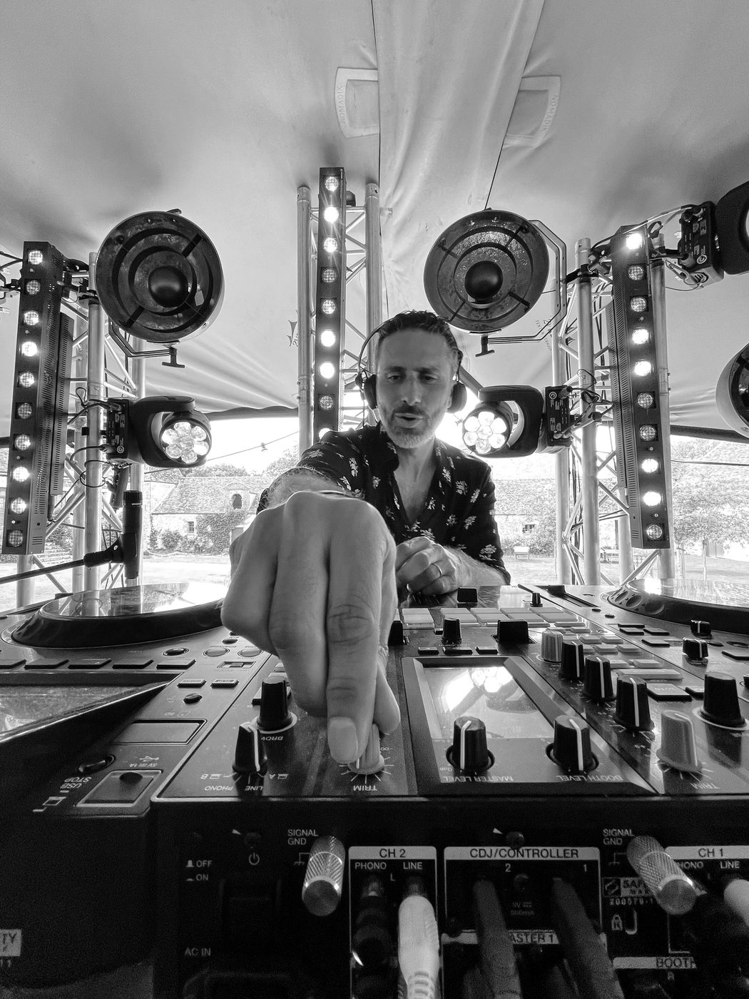 Harry Gozlan DJ booth neon